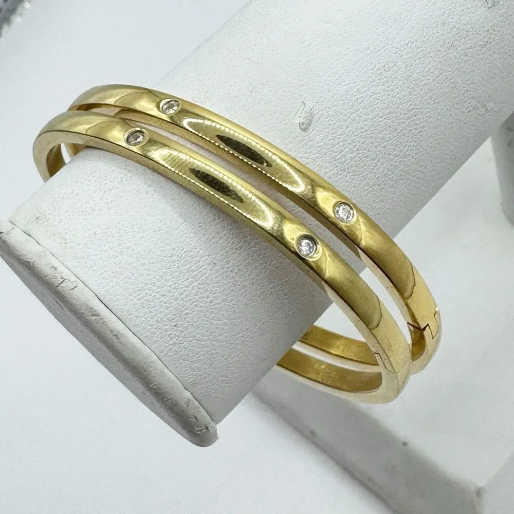 2 Gold Tone Bangle Bracelets With Rhinestone Details Stainless Steel Hinged
